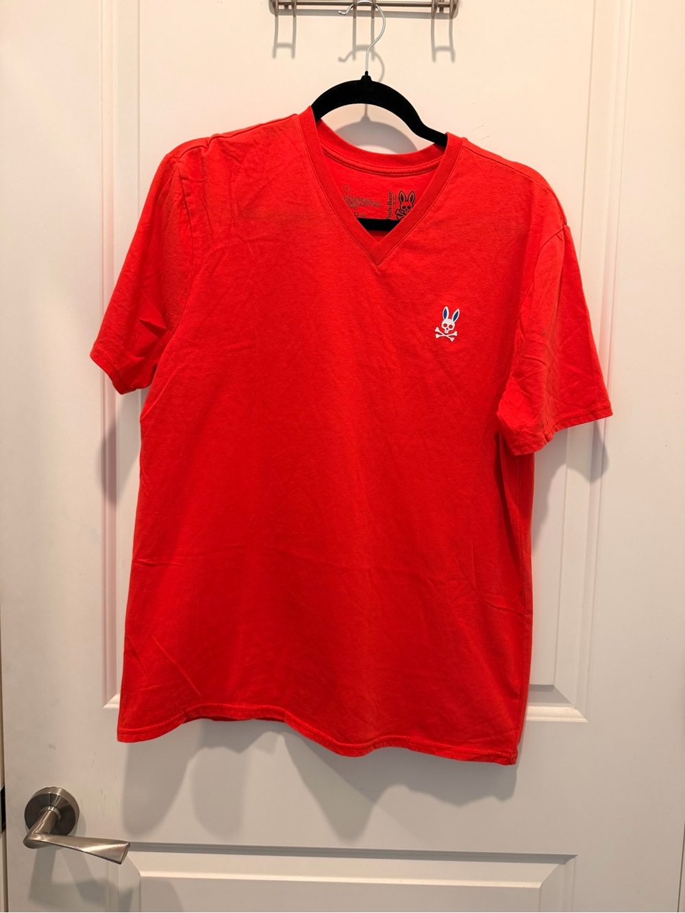 Psycho Bunny Red V-Neck
T-Shirt with Skull and Crossbones Logo Size L